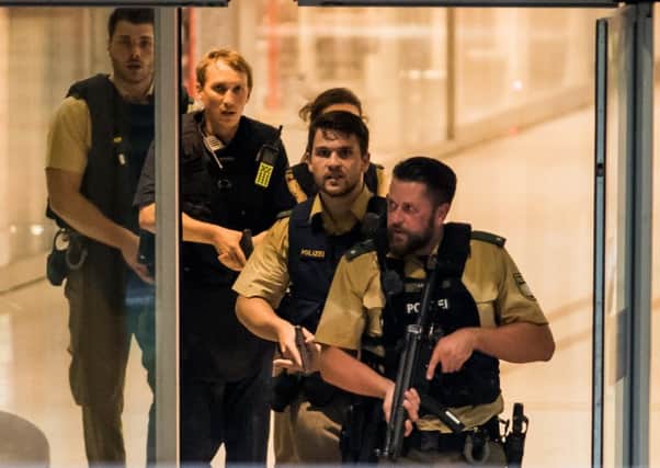 Police officers respond to a shooting at the Olympia Einkaufzentrum  in Munich, Germany. Picture: Joerg Koch/Getty Image