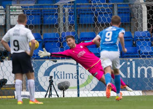 Falkirk keeper Danny Rogers cant reach Danny Swansons 38th-minute penalty  the third one he faced. Pic: Universal