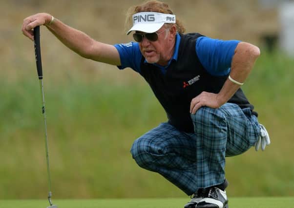 Miguel Angel Jimenez of Spain lines up a putt at the 18th during the third day of the Senior Open Championship at Carnoustie .
Picture: Mark Runnacles/PA