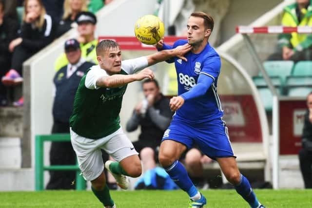 Hibernian's Scott Martin, left, battles with Birmingham's Andrew Shinnie. Picture: Rob Casey/SNS Group