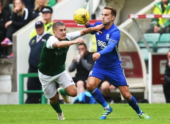 Hibernian's Scott Martin, left, battles with Birmingham's Andrew Shinnie. Picture: Rob Casey/SNS Group