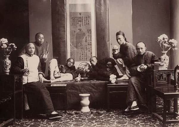 An opium den in China around 1880. Use of the drug permeated every level of Chinese society despite repeated attempts to clamp down on its trade and consumption. PIC Lai Afong/Wikicommons/CC