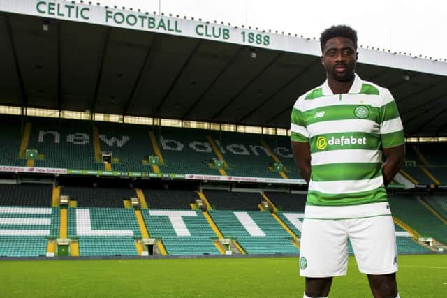 Kolo Toure dons his new colours at Parkhead. Picture: Craig Foy/SNS Group