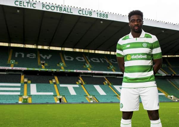 Kolo Toure dons his new colours at Parkhead. Picture: Craig Foy/SNS Group