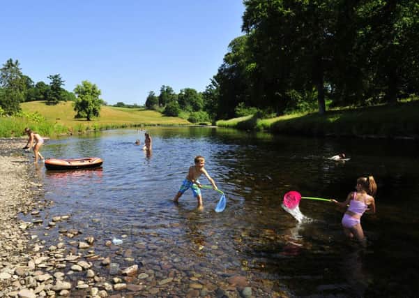 Young people enjoy fun in the River Teith at Doune.  Picture Robert Perry