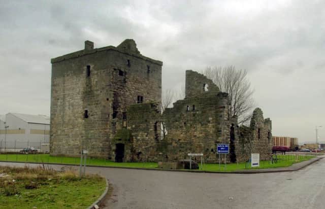 Rosyth Castle, which dates to the 15th century, once stood on a small island but is now surrounded by dockyard buildings. Picture Neil Hanna/TSPL