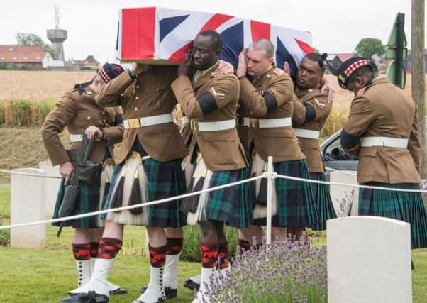 Soldiers carry the casket of First World War Lance Corporal John Morrison at the Woburn Abbey cemetery in Cuinchy, northern France, during an interment ceremony 100 years after his death. Picture: AFP/Getty