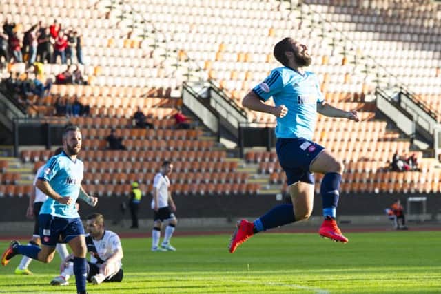 Hamilton's Alex D'Acol celebrates after scoring his side's second goal to make it 2-2 at Meadowbank. Picture: SNS Group