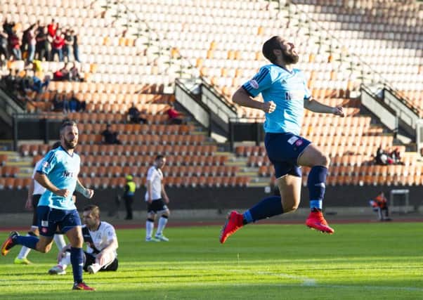 Hamilton's Alex D'Acol celebrates after scoring his side's second goal to make it 2-2 at Meadowbank. Picture: SNS Group