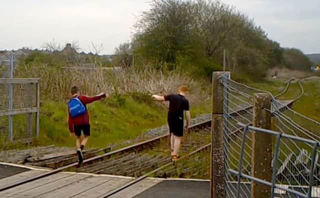 Parents have been warned that children are almost twice as likely to trespass on the railway in the summer than the winter. Picture: PA