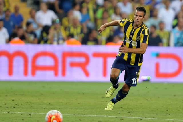 Robin van Persie in action for Fenerbahce against Shakhtar Donetsk. The Dutch striker has been linked with a move to Rangers. Picture: Getty Images