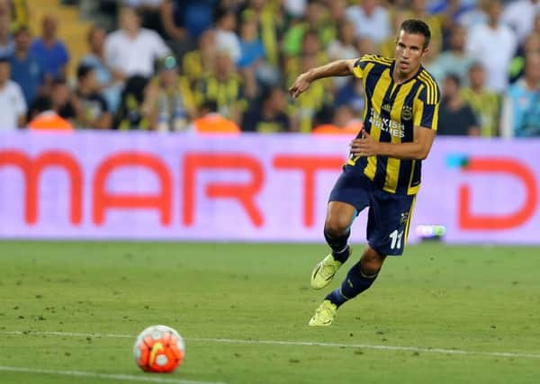 Robin van Persie in action for Fenerbahce against Shakhtar Donetsk. The Dutch striker has been linked with a move to Rangers. Picture: Getty Images
