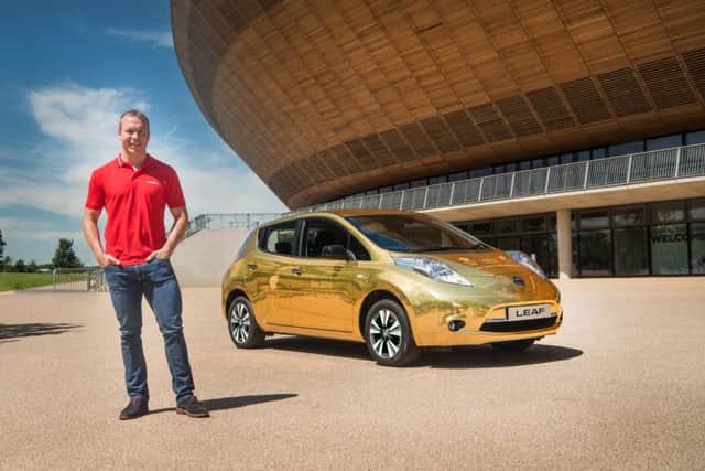 Sir Chris Hoy with a golden Nissan