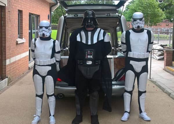 Darth Vadar and Stormtroopers give fan Andrew Strachan the send off he wanted. Picture: SWNS
