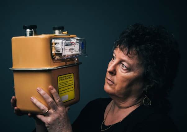 Poet laureate, Carol Ann Duffy, holds up the inspiration for her poem Meters. Picture: Contributed