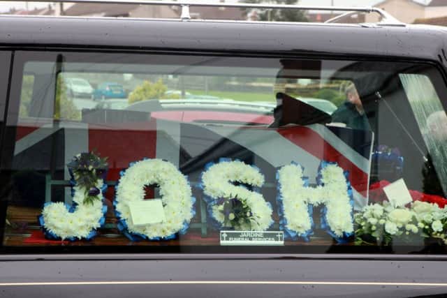 The funeral cortege Corporal Josh Hoole passes through his home town of Ecclefechan. Picture: SWNS