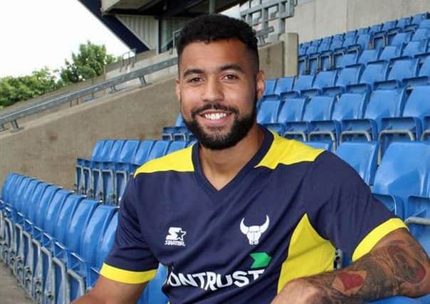 Former Dundee striker Kane Hemmings poses in the Oxford United kit after completing his move. Picture: Oxford United FC