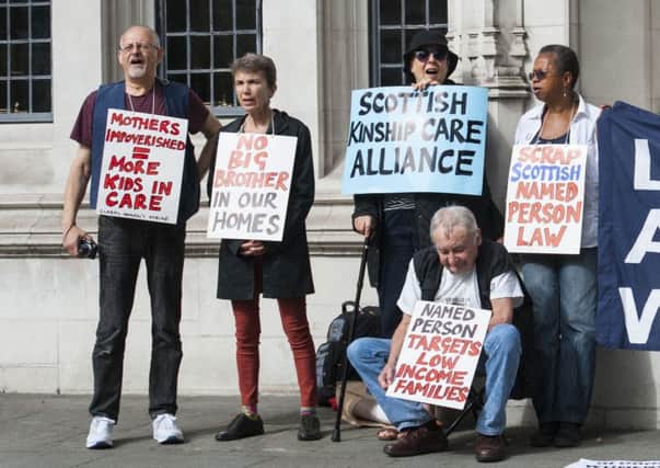 Protesters make their case outside the Supreme Court 
in London. Picture: Lauren Hurley/PA