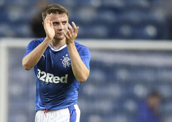 Jordan Rossiter at full-time applauds the support after Rangers' BetFred Cup win over Stranraer. Picture: SNS