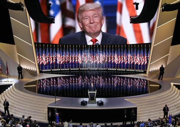 Donald Trumps campaign has harnessed feelings of us and them to create a strong group identity. Picture: AP
