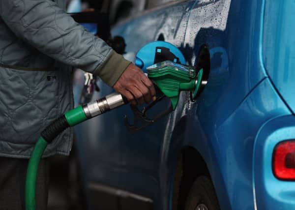 Low petrol prices help households and hauliers, but spell trouble for the North Sea. Picture: Dan Kitwood/Getty