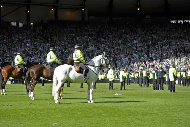 A total of 55 arrests have now been made over the disorder following the Scottish Cup final. Picture: Neil Hanna