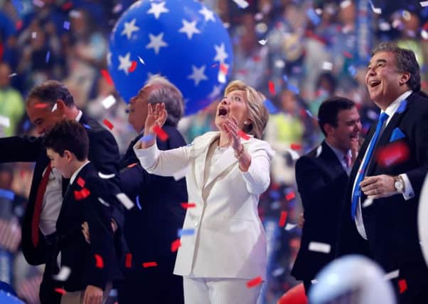 Democratic presidential candidate Hillary Clinton watches balloons drop at the end of the fourth day of the Democratic National Convention. Picture: Getty Images