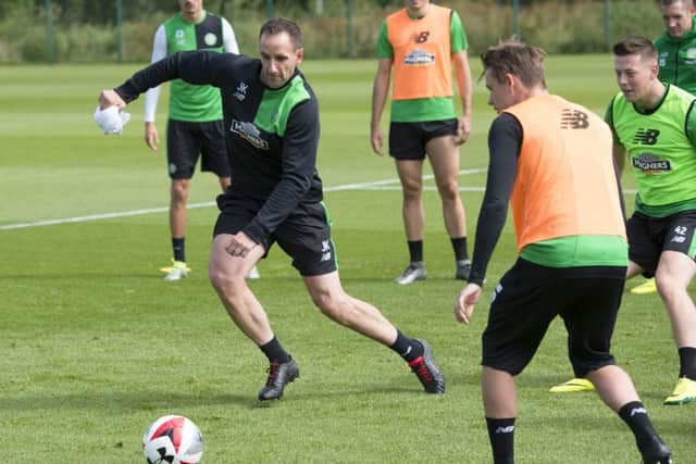 Celtic coach John Kennedy shows his skills as Celtic train ahead of their clash with Barcelona. Picture: SNS.