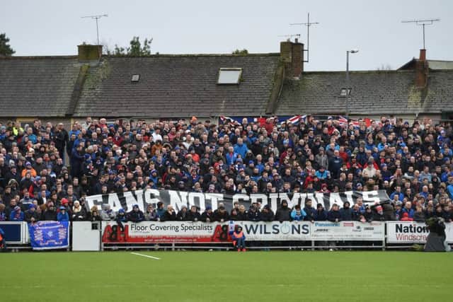 Fans make their feelings known about the Scottish legislation. Picture: SNS Group