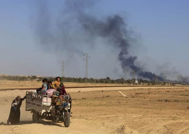 There is likely to be a humanitarian crisis as civilians flee their homes during clashes between Iraqi security forces and Islamic State. Picture: AP