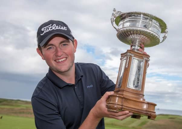 George Duncan with the Scottish Amateur Championship trophy. Picture: Kenny Smith