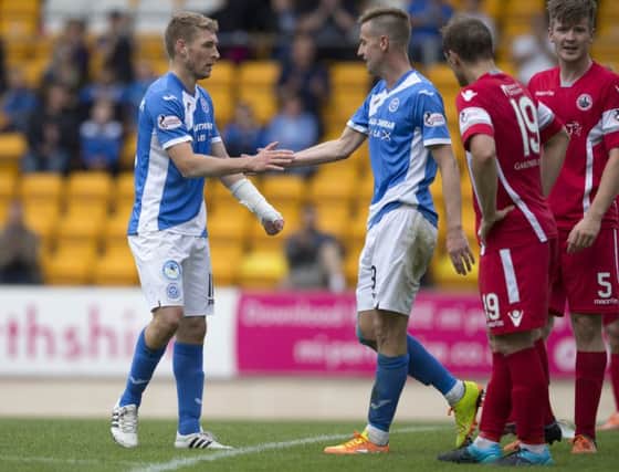 David Wotherspoon, left, celebrates his 90th-minute goal with team-mate Steven MacLean. Photograph: Graeme Hart
