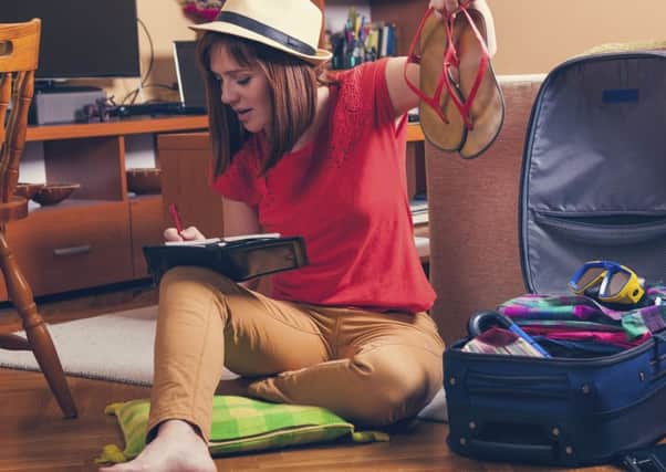 Women start packing an average of six days in advance of a trip, compared with four days for men. Picture: Getty Images/iStockphoto