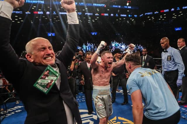 The delight on Barry McGuigans face is clear to see as Carl Frampton celebrates his WBA featherweight victory over Leo Santa Cruz at New Yorks Barclays Center. Picture: Getty Images