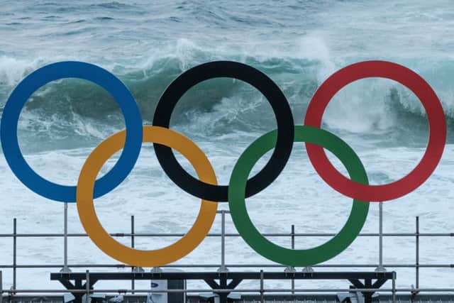 The Olympic rings are in place at the Beach Volleyball Arena on Copacabana Beach. Picture: AFP/Getty Images
