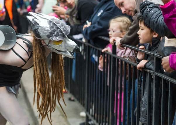 Performer interacts with the public at the Edinburgh Festival Carnival. Picture: Steven Scott Taylor
