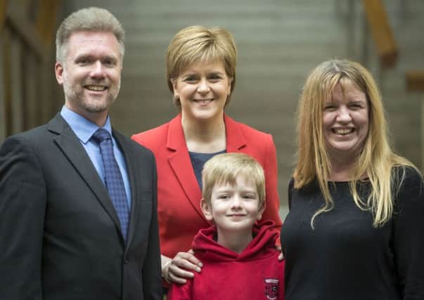 The Brain family meet First Minister Nicola Sturgeon. Picture: PA