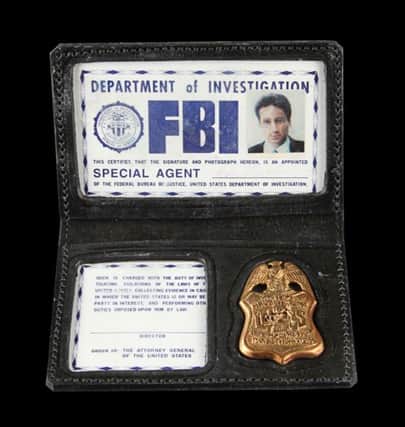 Do you believe... you could be the next owner of the X Files' Fox Mulder's FBI badge?