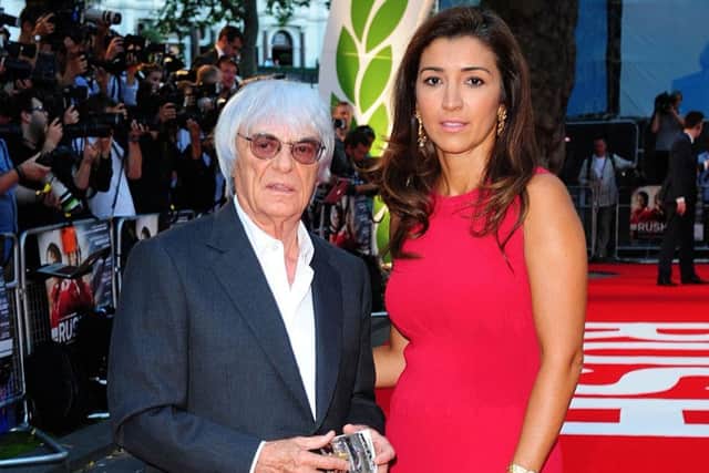 Bernie Ecclestone and wife Fabiana Flosi, whose mother, Aparecida, was discovered in a house near Sao Paulo. Picture: PA