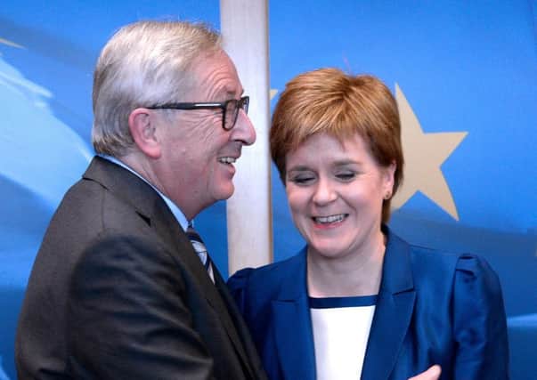 European Union Commission president Jean-Claude Juncker meets Nicola Sturgeon before their meeting in Brussels. Picture: Thierry Charlier/Getty