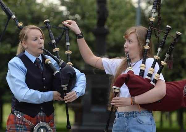 Hayley McInnes, 25, from Shotts & Dykehead Pipe Band (left) and Robyn McKay, 19, from St Lawrence O'Toole Pipe Band, Dublin. Picture: SNS Group