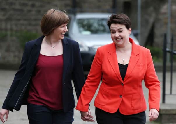 Scottish Conservative leader Ruth Davidson arrives with partner Jen Wilson to vote in the Scottish Parliament elections. Picture: PA