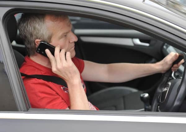 Drivers in Motherwell were the worst in the UK for using their phones while driving. Picture: TSPL/Phil Wilkinson