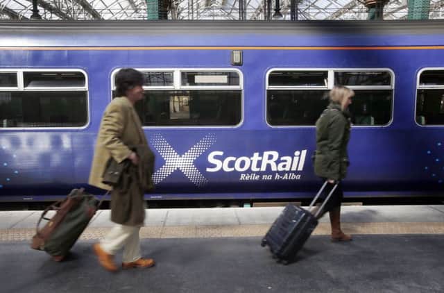 ScotRail passengers have endured 12 days of strikes since June with buses being used on some routes. Picture: PA