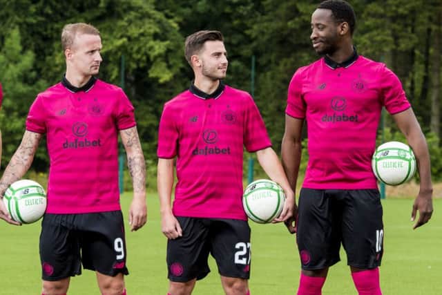 Leigh Griffiths models Celtic's new third kit alongside Patrick Roberts and Moussa Dembele. Picture: Craig Williamson/SNS