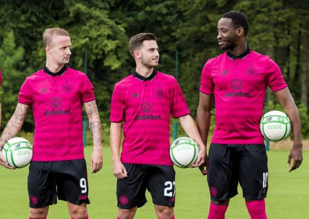 Leigh Griffiths models Celtic's new third kit alongside Patrick Roberts and Moussa Dembele. Picture: Craig Williamson/SNS
