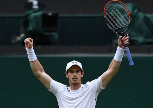 Andy Murray's Wimbledon T-shirt makes Â£10,000 for charity. Picture: AFP/Getty Images