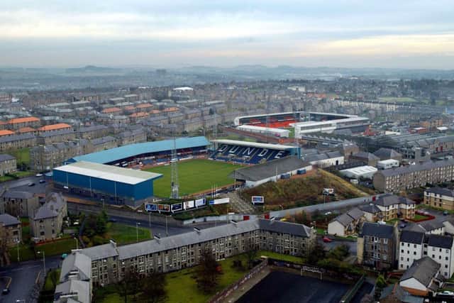 Dens Park with Tannadice Stadium in the background. Picture: SNS