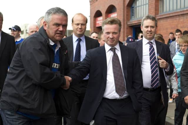 Craig Whyte is welcomed to Ibrox. The relationship with the fans quickly turned sour. Picture: SNS
