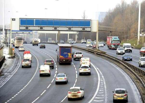 Scotlands motorway surfaces have taken a pounding, with almost half needing to be resurfaced, latest figures show. Picture: John Devlin